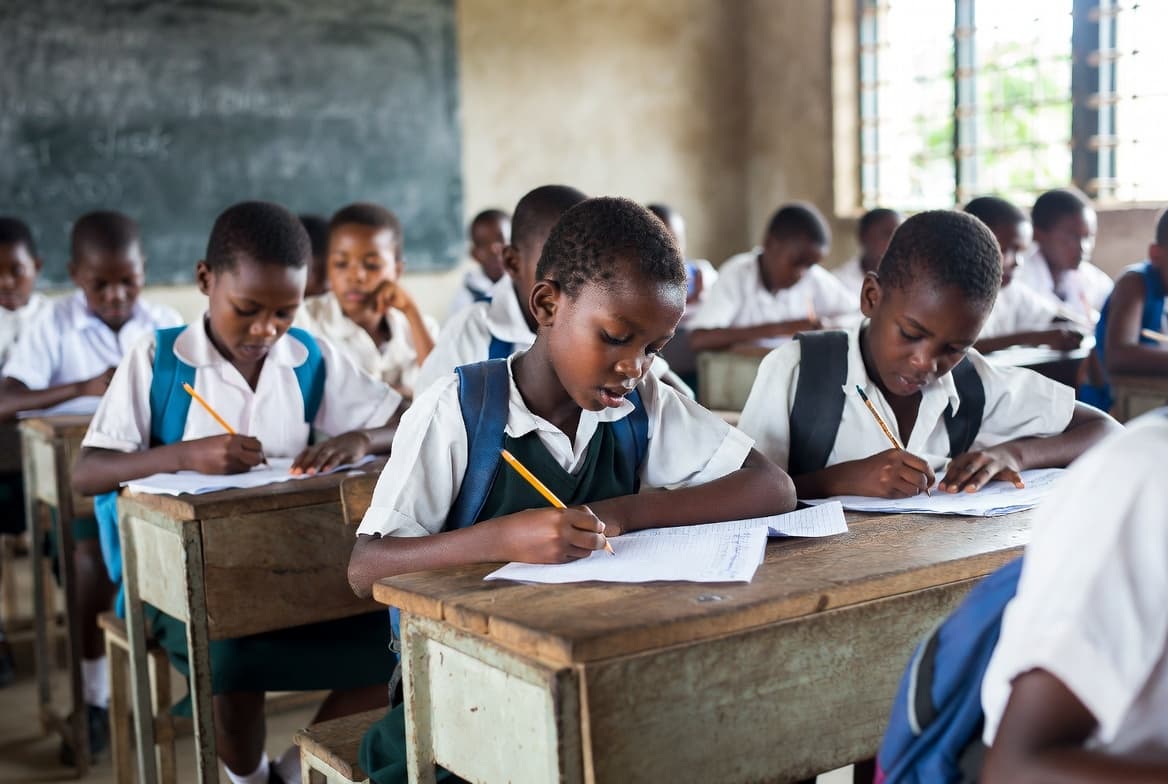 African children learning in a classroom